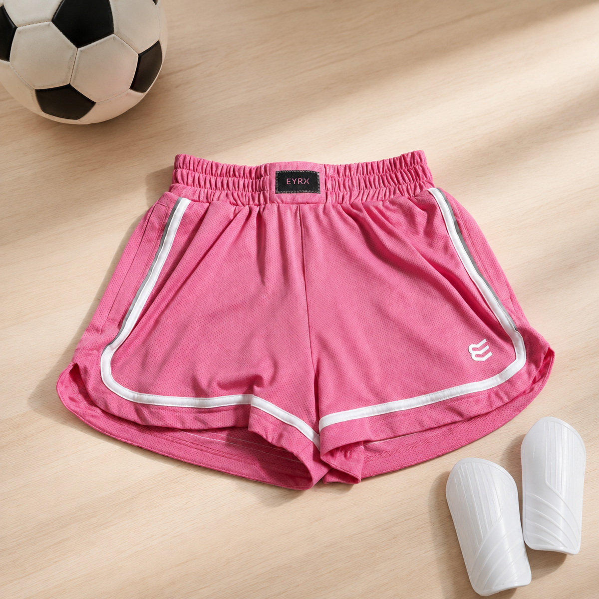 CoreFlex girls' youth athletic shorts in Carnation