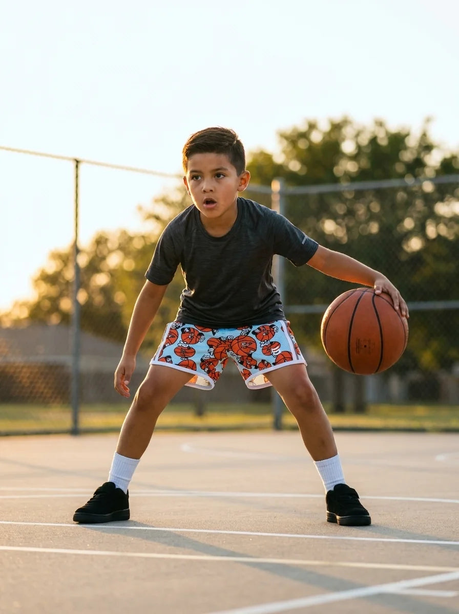 Youth athlete wearing Eyrx CoreFlex performance shorts